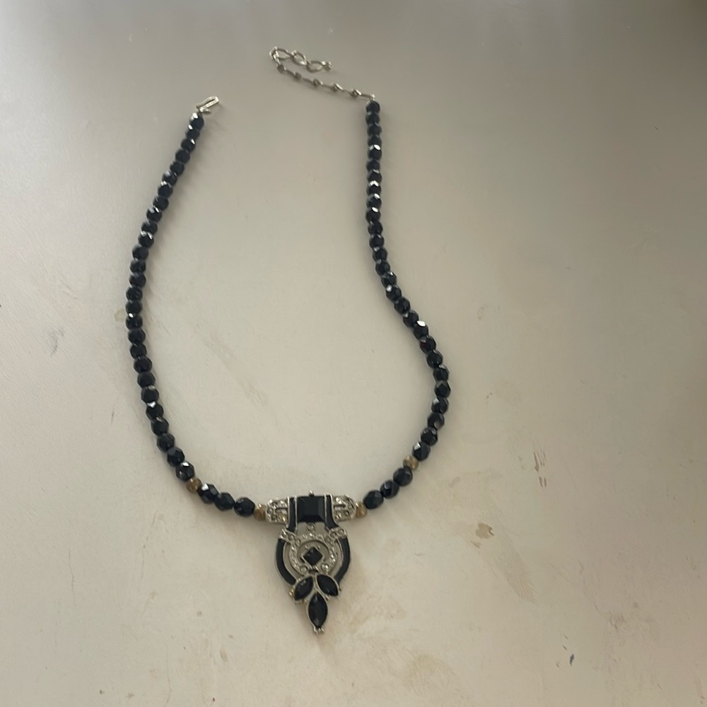 Black beaded pendant necklace